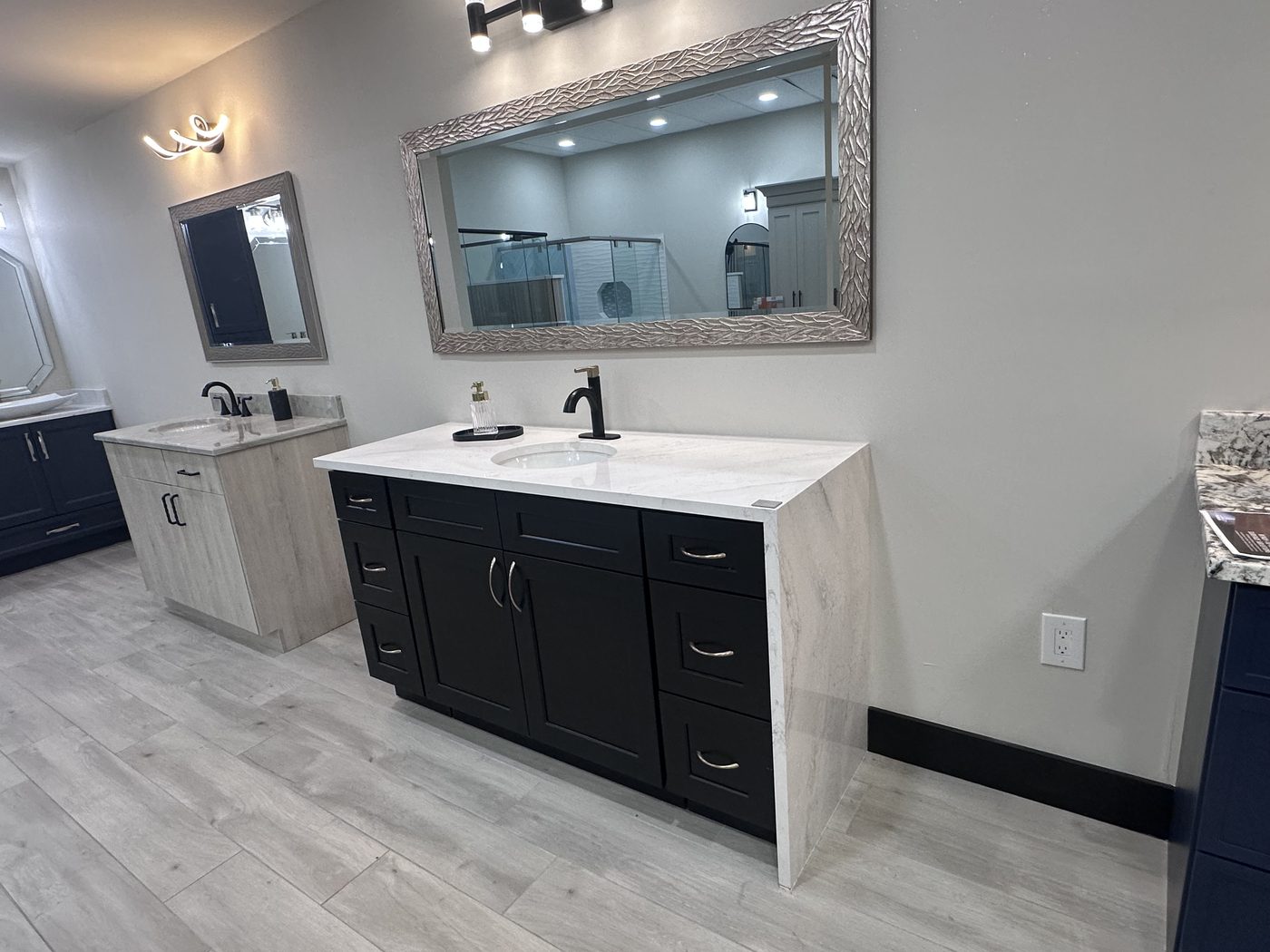 A finished bathroom by Cabinet and Flooring Outlet